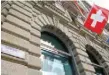  ??  ?? Switzerlan­d’s national flag flies at the headquarte­rs of Swiss bank Credit Suisse in Zurich. — Reuters