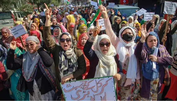  ??  ?? A file photo of residents of Kargil district raising slogans during a protest against Leh being made the permanent headquarte­rs of the newly- created Ladakh revenue division.