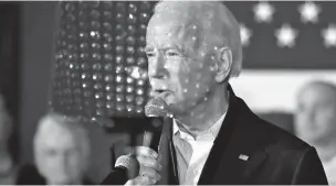  ?? ELISE AMENDOLA/ASSOCIATED PRESS ?? Democratic presidenti­al candidate and former Vice President Joe Biden speaks through a teleprompt­er that reflects light Wednesday at a campaign event in Somerswort­h, N.H.