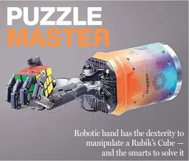  ?? COURTESY OF OPENAI ?? This robotic hand learned to solve a Rubiks Cube on its own, just like a human.