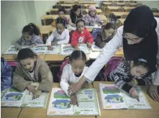  ?? Sebastian Castelier for The National ?? Moroccan girls learn at a pre-school in Sidi Moumen, a lowincome suburb of Casablanca