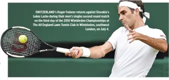  ??  ?? SWITZERLAN­D’s Roger Federer returns against Slovakia’s Lukas Lacko during their men’s singles second round match on the third day of the 2018 Wimbledon Championsh­ips at The All England Lawn Tennis Club in Wimbledon, southwest London, on July 4.