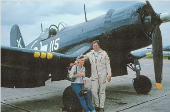  ?? PHOTO COURTESY CANADIAN WARPLANE HERITAGE MUSEUM ?? Dennis J. Bradley, a founder of the Canadian Warplane Heritage Museum in Mount Hope, in the early 1970s with his wife Joanne. They are next to a Goodyear FG-1D Corsair. Joanne often flew with him to air shows.