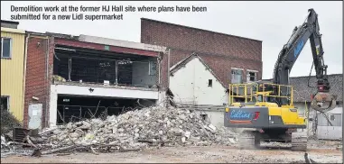  ??  ?? Demolition work at the former HJ Hall site where plans have been submitted for a new Lidl supermarke­t