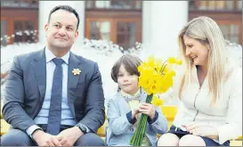  ?? (Pic: Andres Poveda) ?? PENNY FOR MY THOUGHTS - An Taoiseach, Leo Varadkar is pictured at a photocall on Wednesday with Irish Cancer Society’s CEO, Averil Power and 5 year old Traolach Hand Codd, to celebrate upcoming Daffodil Day, this Friday, March 22nd. Who would guess what announceme­nt would come later in the day?