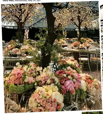  ??  ?? Opulent: Dinner tables covered with pink and white roses