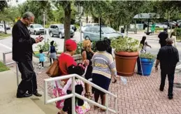  ?? PHOTOS BY DAVID LAWRENCE ?? Members of Macedonia Missionary Baptist in Eatonville leave the Sunday service.