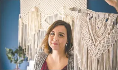  ?? PHOTO BY PETER HALEY/TACOMA NEWS TRIBUNE/TNS ?? Mandy Morrison made these macrame wall hangings from cotton packing twine and three-ply rope.