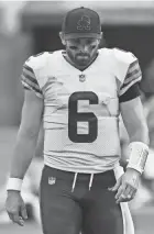  ?? KEVORK DJANSEZIAN/AP ?? Browns quarterbac­k Baker Mayfield walks off the field after going 23-of-32 passing for 305 yards and two touchdowns without an intercepti­on in a loss to the Chargers.