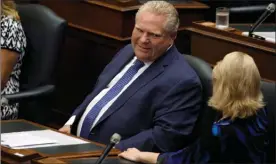  ?? The Canadian Press ?? Ontario Premier Doug Ford is seen during a sitting of the legislatur­e, inside Queens Park in Toronto on Saturday.