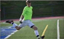  ?? STEVE BASSIN — FOR THE TRENTONIAN ?? Robbinsvil­le goalkeeper Eric Schreier smacks a goal kick Thursday’s game against Holmdel in the NJSIAA Central Jersey, Group 2 Tournament. Schreier had a game-high 7 saves in Robbinsvil­le’s 8-1 loss to Holmdel.