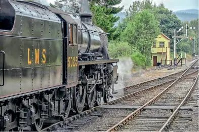  ?? Graham Nuttall ?? Shades of the Highland Main Line. Newly-overhauled LMS Stanier 4-6-0 ‘Black Five’ 5025 awaits departure from Boat of Garten, Strathspey Railway, with the 15.00 Aviemore-broomhill on September 10.