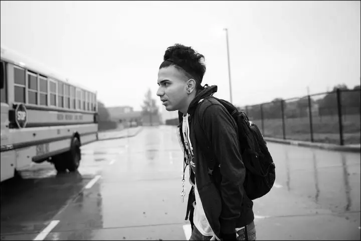  ?? PHOTOS BY LOREN ELLIOTT / THE NEW YORK TIMES ?? Dennis Rivera-Sarmiento graduated from high school with his classmates on June 2, but he faces possible deportatio­n following a schoolyard scuffle.