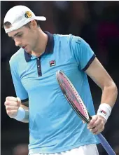  ?? AFP ?? USA’s John Isner celebrates winning a point against Argentina’s Juan Martin del Potro during the quarterfin­al round at the ATP World Tour Masters 1000 indoor tennis tournament on Friday in Paris. —