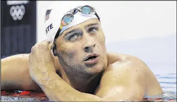  ?? MICHAEL SOHN / ASSOCIATED PRESS ?? Swimmer Ryan Lochte was charged by police in Brazil with filing a false robbery report over an incident during the Olympics in Rio de Janeiro. Under Brazilian law, the penalty for falsely filing a crime report is a maximum of 18 months in prison.