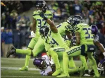  ?? JOSHUA BESSEX - THE NEWS TRIBUNE VIA AP ?? Seattle Seahawks linebacker Bobby Wagner stops Minnesota Vikings running back Latavius Murray (25) on a fourth-and-one run to force a turnover on downs in the third quarter of an NFL football game at CenturyLin­k Field in Seattle, Wash., on Monday, Dec. 10, 2018.