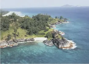  ??  ?? Silhouette Island, above; the giant tortoise, top