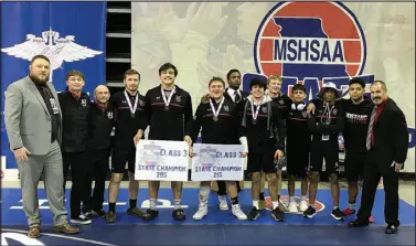  ?? Bennett Horne/McDonald County Press ?? The McDonald County Mustangs finished fifth overall in Class 3 with 88 points at the 2023 MSHSAA Wrestling Championsh­ips held Friday and Saturday, Feb. 24-25, at Mizzou Arena in Columbia. Team members at the event included coaches Josh Factor, Beau Bennett, Joshua Tyler, Alan Callahan and Oscar Ortiz and wrestlers Colter Vick, Levi Smith, Blaine Ortiz, Samuel Murphy, Jayce Hitt, Malosi Sosef, Robinson Yoshino and Eberson Perez.