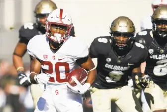  ?? David Zalubowski / Associated Press ?? Bryce Love had more than enough speed to score against Colorado on Saturday. The North Carolina native chose Stanford over SEC, ACC schools.