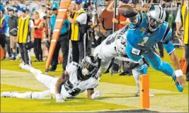  ?? Mike Mccarn The Associated Press ?? Former Panthers quarterbac­k Cam Newton (1), shown in 2017, joined the Patriots this year aiming to prove to himself that he still can play at a high level.