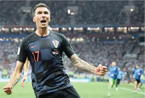  ?? Picture: EPA ?? LOVING THE MOMENT: Mario Mandzukic of Croatia celebrates his goal in the semi-final against England last night.