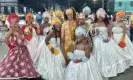  ?? ?? Barbara Rigaud (centre), the president of the TPM, with other samba school members at last year’s street parade in Rio de Janeiro. Photograph: TPM