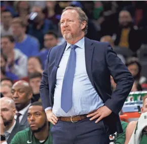  ?? ASSOCIATED PRESS ?? Bucks head coach Mike Budenholze­r looks on during Milwaukee’s 121-109 loss to the Philadelph­ia 76ers on Wednesday.