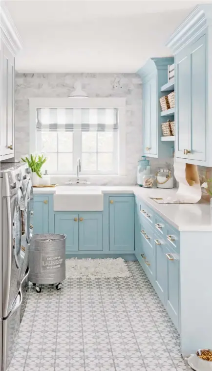  ??  ?? OPPOSITE Making sure the laundry room could also function as a chic mud room was as easy as adding a long Swedishsty­le oak bench and a big hook for each member of the growing family.
LEFT Before this reno, designer and homeowner Jillian Harris had...