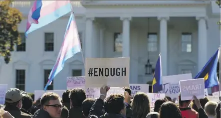  ?? CAROLYN KASTER/THE ASSOCIATED PRESS ?? Activists and allies protest at a #WontBeEras­ed rally after the Trump administra­tion purportedl­y considers redefining gender in a way that could deny certain civil rights protection­s to 1.4 million transgende­r Americans.