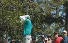  ?? Reuters ?? Justin Rose of England reacts to his tee shot off the fourth tee in second round play during the 2017 Masters at Augusta National Golf Club on Friday.