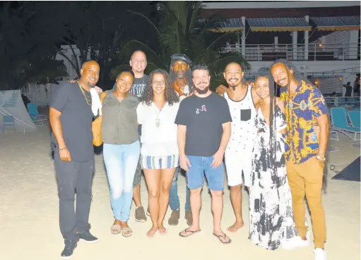  ?? PHOTOS BY JANET SILVERA ?? Negril film-maker Storm Saulter (centre, front row) is flanked by other film-makers who showcased at the Skylark Film Nights. At right is curator of the event, Gareth Cobran.