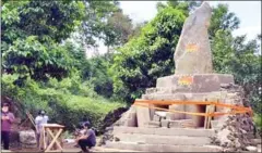  ?? KOMPAS.COM/THE JAKARTA POST ?? Local authoritie­s closed off a tomb built by followers of an indigenous faith group in Indonesia’s West Java province.