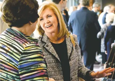  ?? STAFF FILE PHOTO BY C.B. SCHMELTER ?? United States Senate candidate Marsha Blackburn shakes hands during the Hamilton County Republican Party’s annual Lincoln Day Dinner at The Chattanoog­an earlier this year.