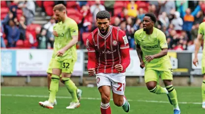  ?? Picture: Rogan Thomson/Bristol City ?? Bristol City’s Nahki Wells celebrates scoring a stoppage-time penalty in Saturday’s 1-1 draw against Huddersfie­ld Town at Ashton Gate