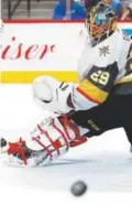  ??  ?? Vegas goaltender Marc-andre Fleury follows the flight of the puck after deflecting a shot in the third period of Saturday’s game.