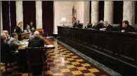  ?? AP/Charleston Gazette-Mail/KENNY KEMP ?? Attorney Teresa Toriseva (left) presents arguments before the West Virginia Supreme Court of Appeals on Monday at the West Virginia Capitol in Charleston,W.Va.