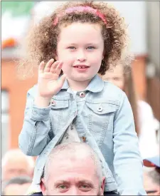  ??  ?? Molly Moore had the best seat in the house for the opening of the Fleadh; on her Dad Paul’s shoulders.