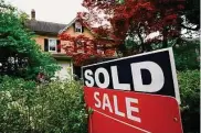  ?? Associated Press ?? A sale sign outside a home in Wyndmoor, Pa., on June 22. On Friday, the National Associatio­n of Realtors reported on sales of existing homes in December.