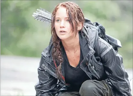  ??  ?? Odds in her favour: Jennifer Lawrence captivates in teen gladiatori­al fantasy The Hunger Games.