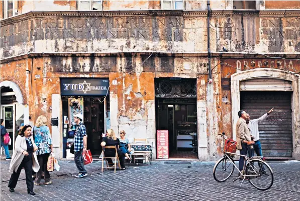  ?? ?? Rome’s Jewish quarter is braced against the rise of fascism more than 75 years after the fall of Mussolini. More trouble is expected tomorrow when employees will have to show a Covid jab certificat­e at their workplaces