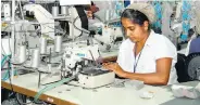  ??  ?? File picture of a garment worker. The writer says that "it is high time that policy makers focus on developing a value propositio­n for women at grass-root level to harness their potential in entreprene­urship".