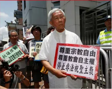  ?? ?? Hong Kong’s outspoken cardinal Joseph Zen (center) and other religious protesters during a protest in 2012