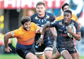  ?? Picture: SOURCED ?? DETERMINED: Aphelele Fassi (with the ball) in action for the Sharks against the Jaguares in the Super Rugby competitio­n