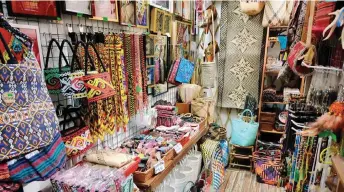  ?? — Bernama photo ?? Sarawakian weaver Alice Umbang says local crafts will gain global recognitio­n if utilised as corporate gifts, especially with the state frequently hosting internatio­nal events.