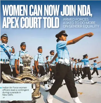  ?? AP ?? ■ Indian Air Force women officers lead a contingent during a parade in New Delhi.