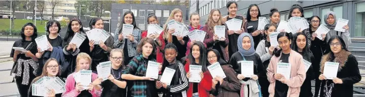  ??  ?? ●●Year Eight girls have been working on a project to change the school curriculum, culminatin­g in 34 billboards going up around Rochdale asking people to sign their petition