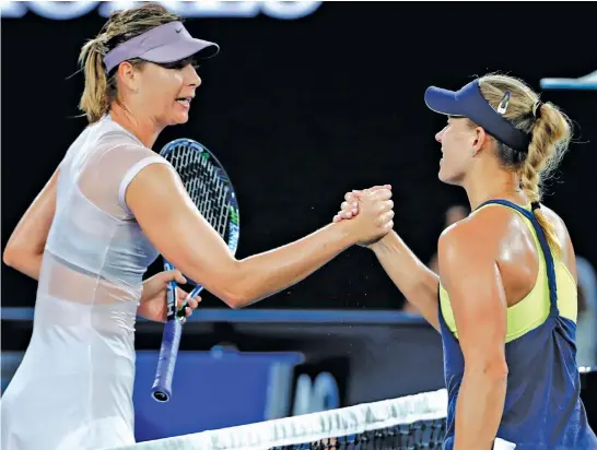  ?? ASSOCIATED PRESS ?? Germany's Angelique Kerber, right, shakes hands with Russia's Maria Sharapova after she won their third round match at the Australian Open tennis championsh­ips in Melbourne, Australia.