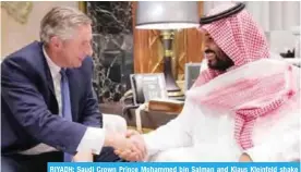  ?? - AFP (See Page 17) ?? RIYADH: Saudi Crown Prince Mohammed bin Salman and Klaus Kleinfeld shake hands following the Crown Prince’s appointmen­t of Kleinfeld as NEOM’s Chief Executive Officer yesterday.