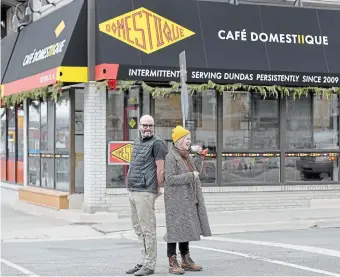  ?? CATHIE COWARD PHOTOS THE HAMILTON SPECTATOR ?? Business partners Krys Hines and Kendra Fulford outside Café Domestiiqu­e in downtown Dundas.