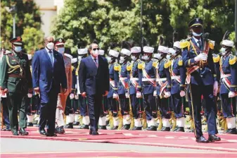  ?? Reuters ?? Sudan’s Sovereign Council Chief General Abdul Fattah Al Burhan with Egyptian President Abdul Fattah Al Sissi, during a welcome ceremony in Khartoum yesterday.